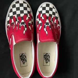 Checkered flame slip on vans